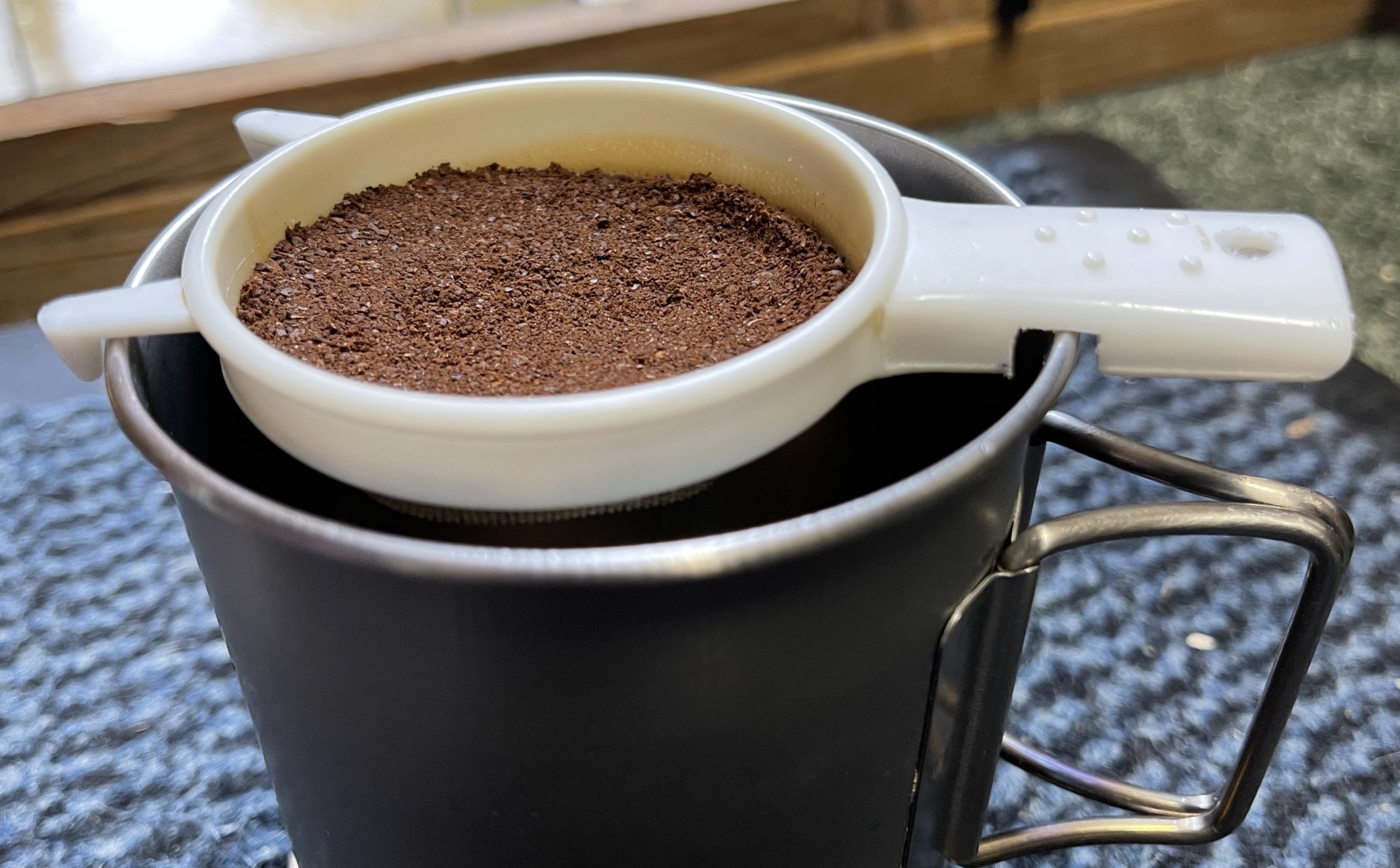 Tea strainer adapted for making camping coffee