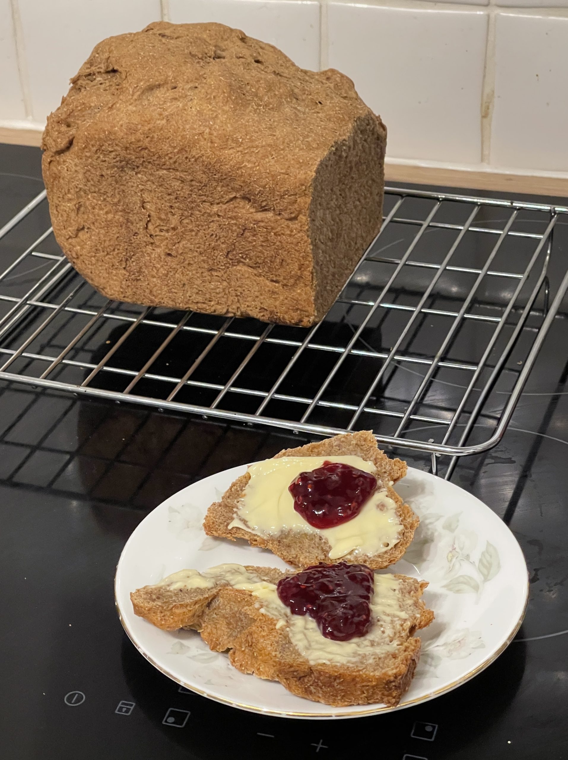 Wholemeal bread and raspberry jam​