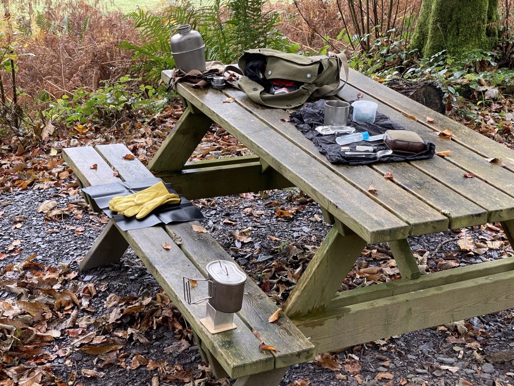 Bushcraft haversack, pocket wood stove, titanium canteen and canteen mug