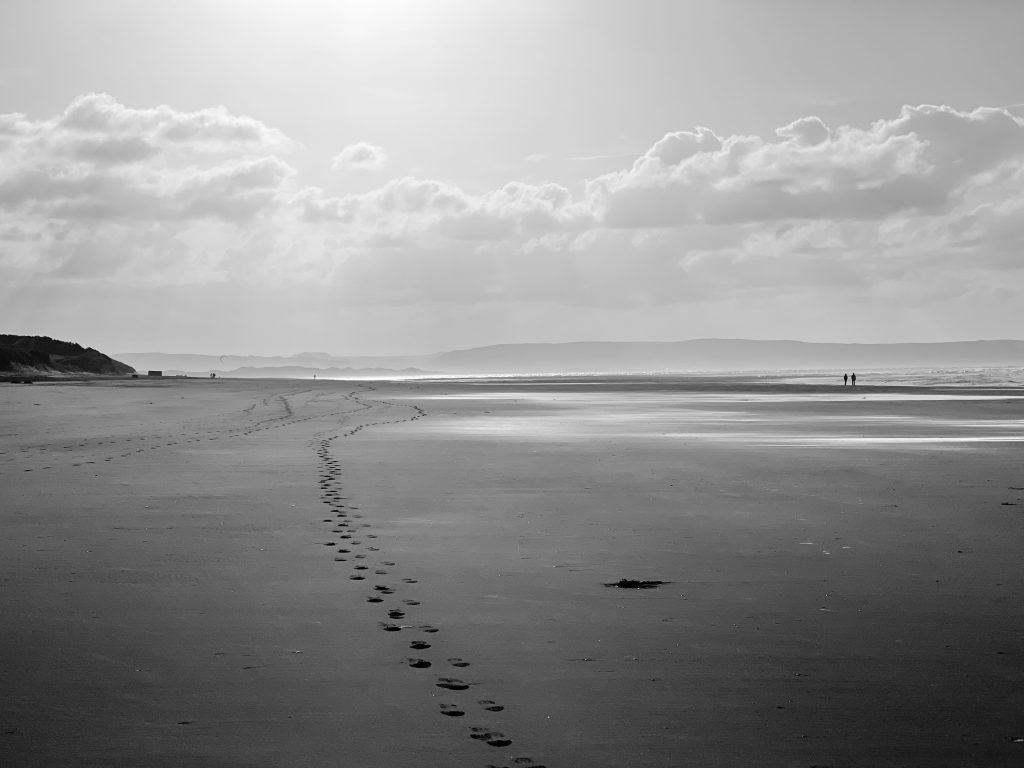 Foot steps in the sand Aberdovey beach