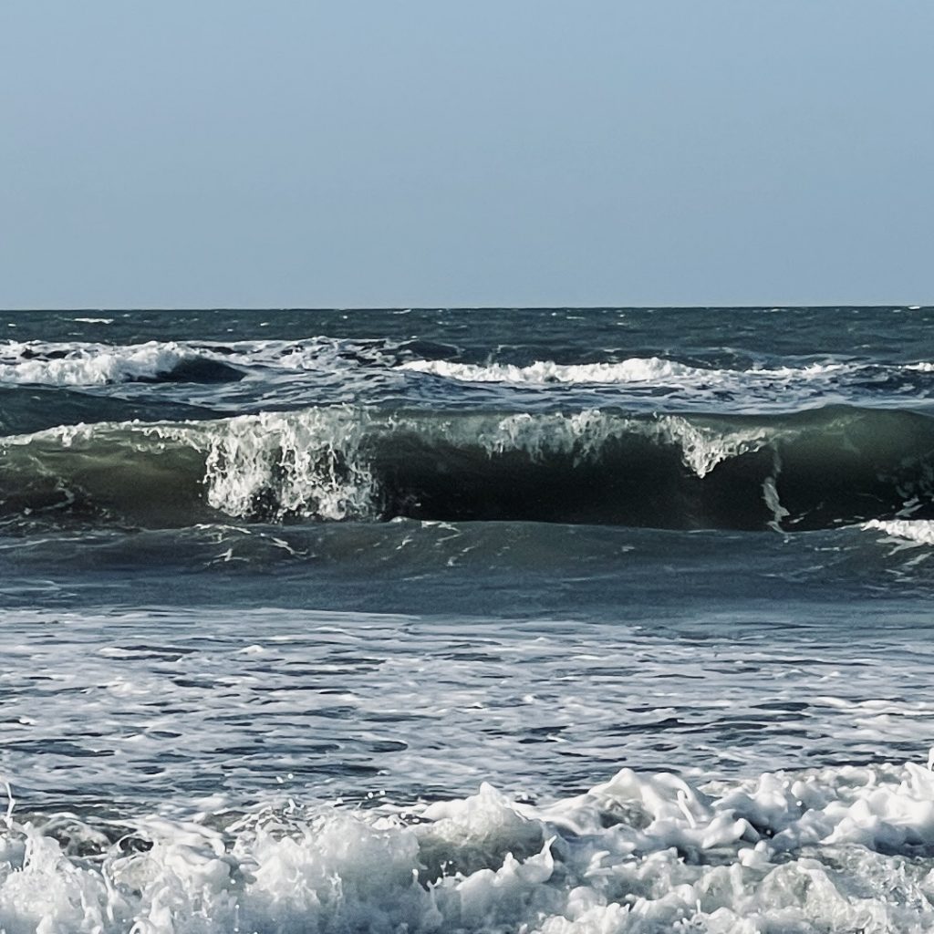 Breaking waves on the beach 