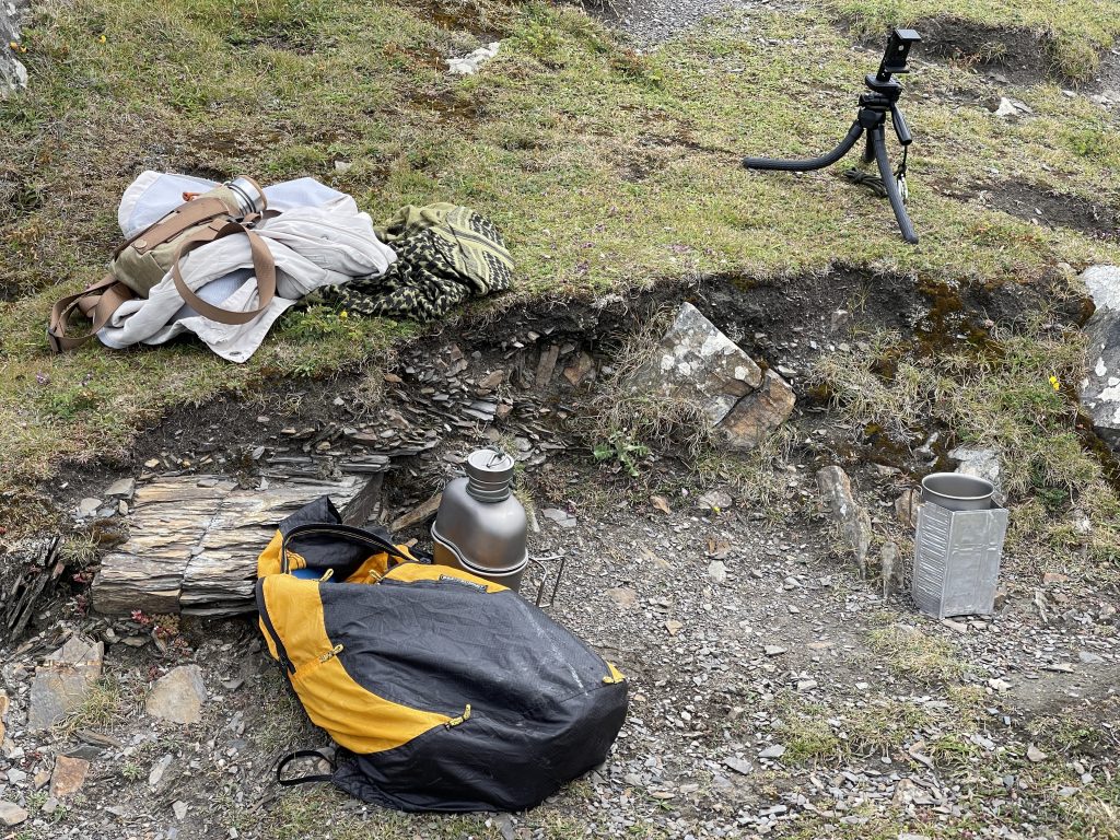 Keith titanium bottle and nesting titanium mug, Alpkit MiTiMug 400, Sea to Summit packable rucksack, dragon fuel stove used in a mini wood stove