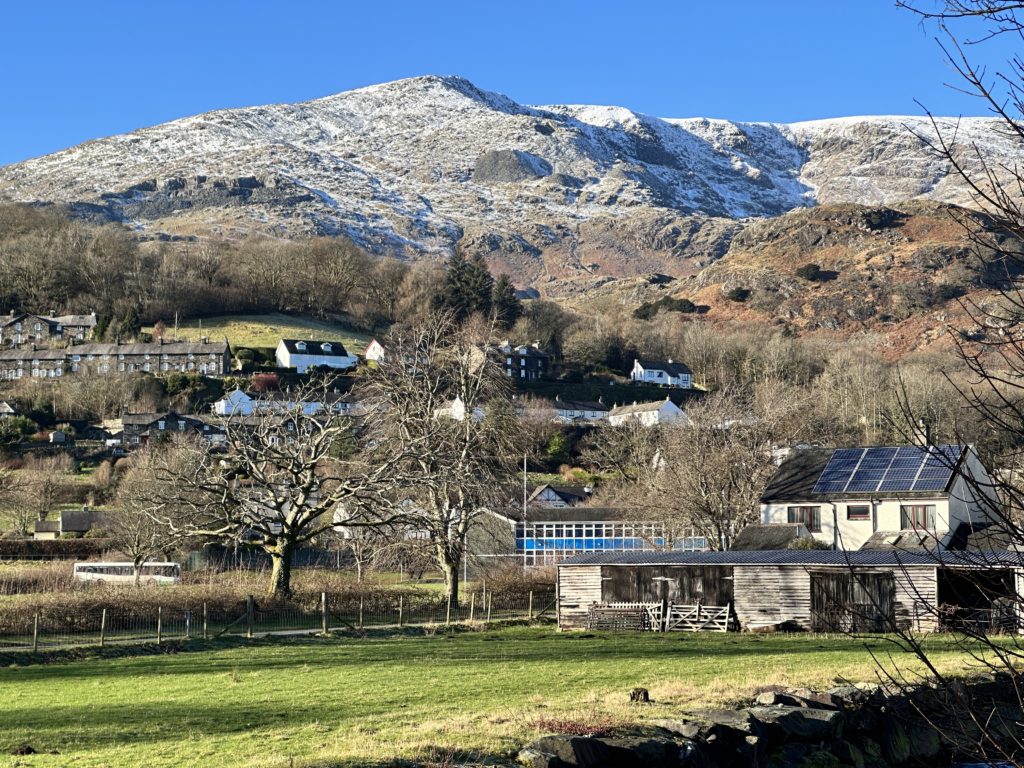 Coniston and snowy mountains