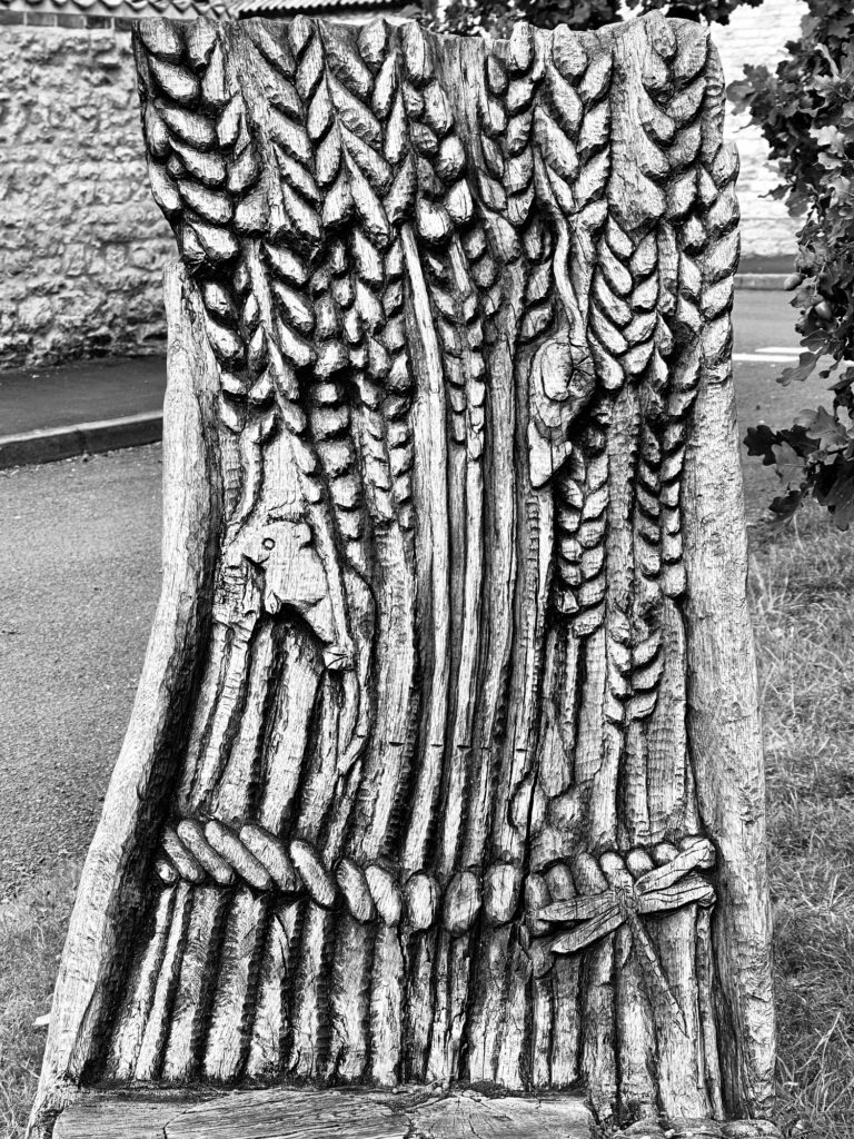 Carved wheat sheaf
